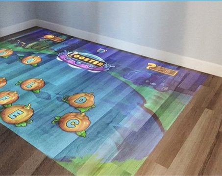 Fish themed game projected onto wooden floor