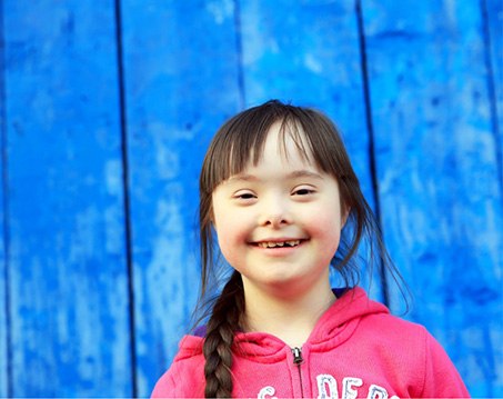 Smiling young girl with hair in braid