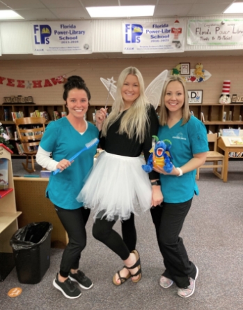 Pediatric dentist dressed as the tooth fairy
